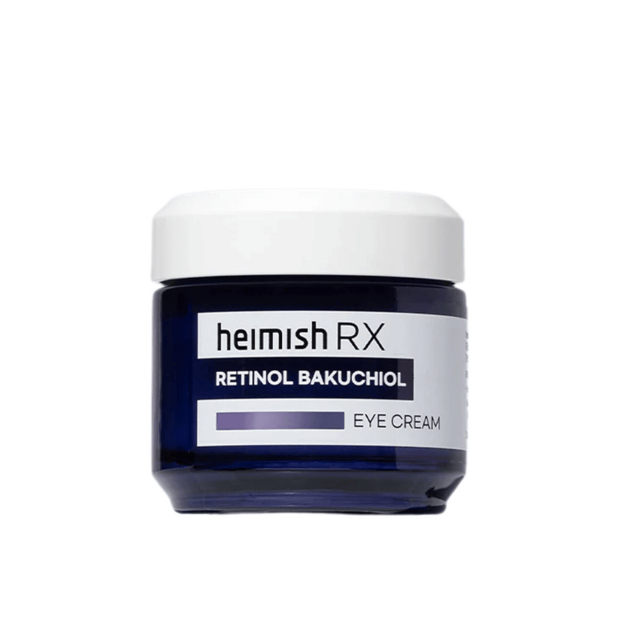 Heimish RX Retinol Bakuchiol Eye Cream i en mörkblå burk med vit lock. En ögonkräm berikad med retinol och bakuchiol för en slätare och fastare hud runt ögonen.